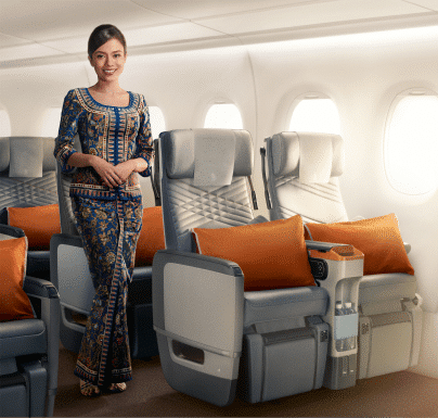 Stewardess in Singapore Airline premium economy class